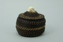 Image of black and white baleen basket with walrus finial